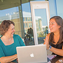 students at a laptop