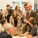 community members, staff, and students networking at the green networking breakfast