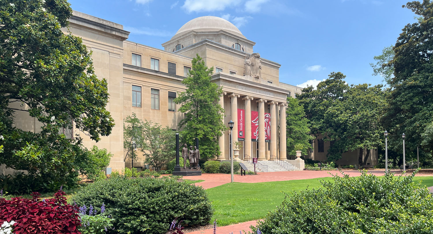 McKissick Museum surrounded by beautiful lush trees of the historic Horseshoe. 