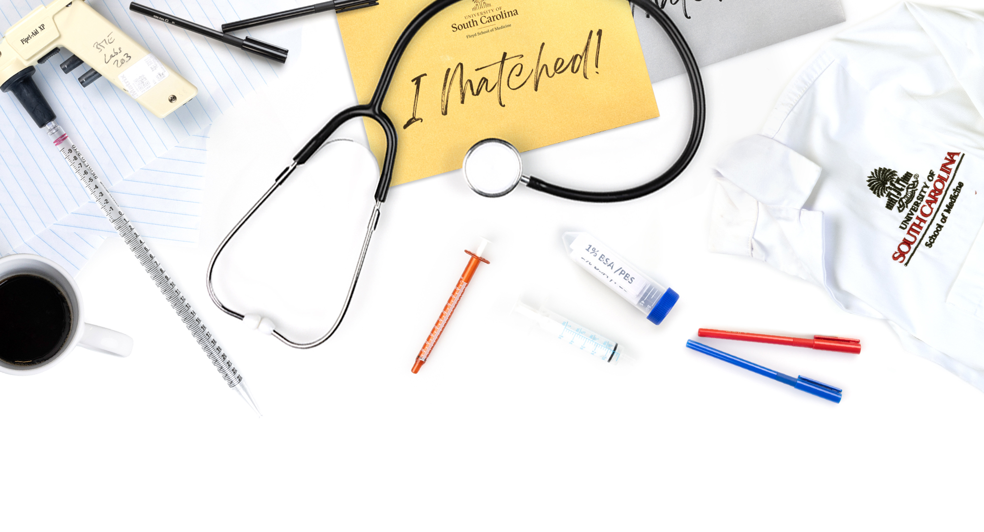 Various items related to the Floyd School of Medicine displayed on a white background. 