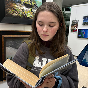 woman reading a text book