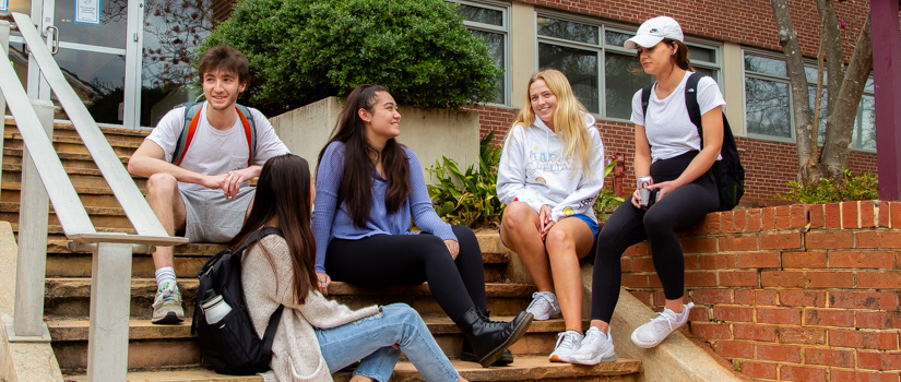 Students discussing their work