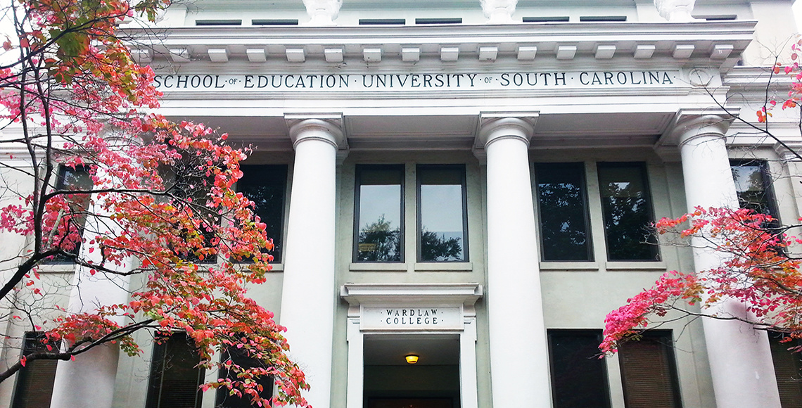 Wardlaw College. Flowering dogwood trees are visible