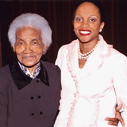 two women standing side by side