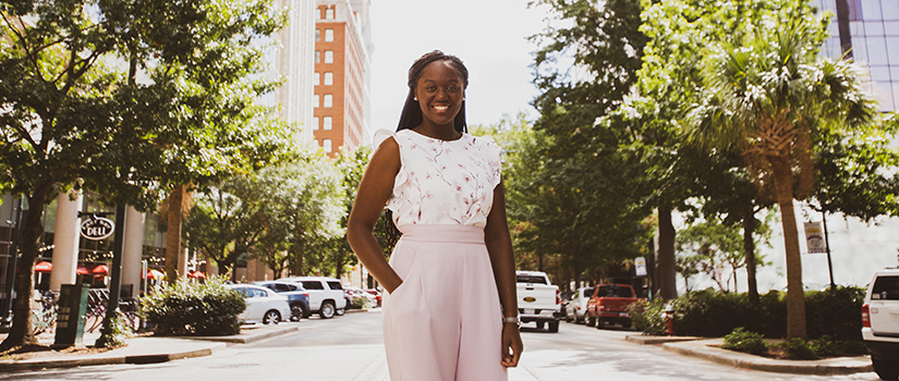 Ogunleye smiles on the streets of Columbia.