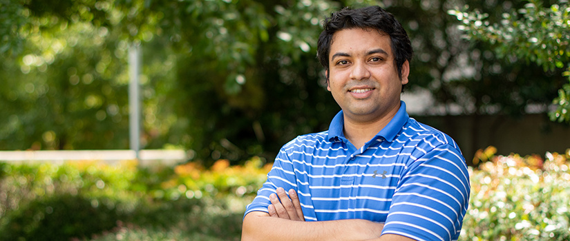 Sudipta Saha stands outside the Swearingen building.