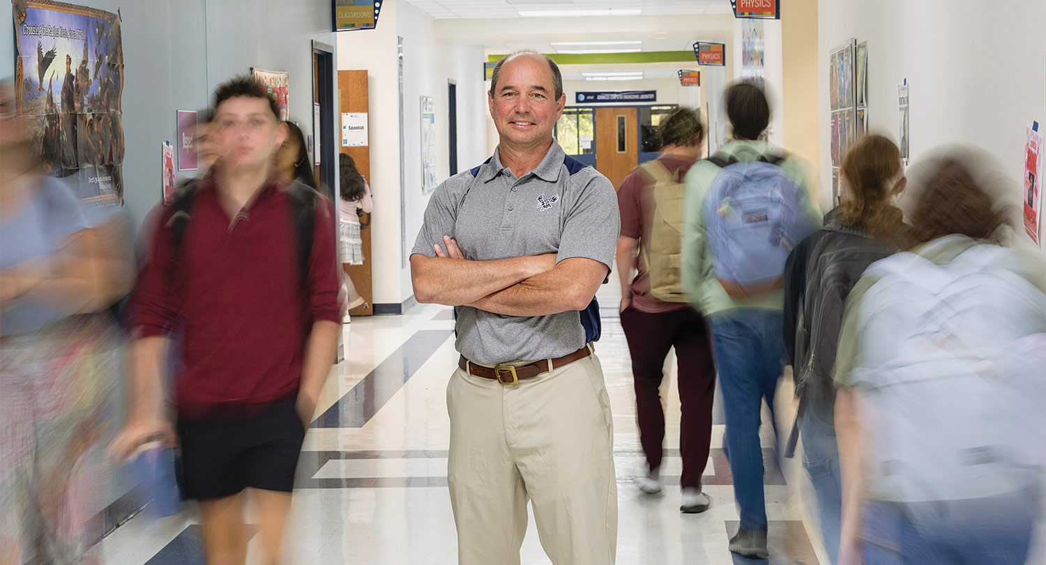 Danny Dorsel smiles in the hallway of S.C. Governor’s School for Science and Mathematics