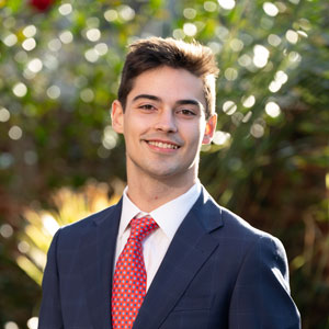 man stands wearing a tie